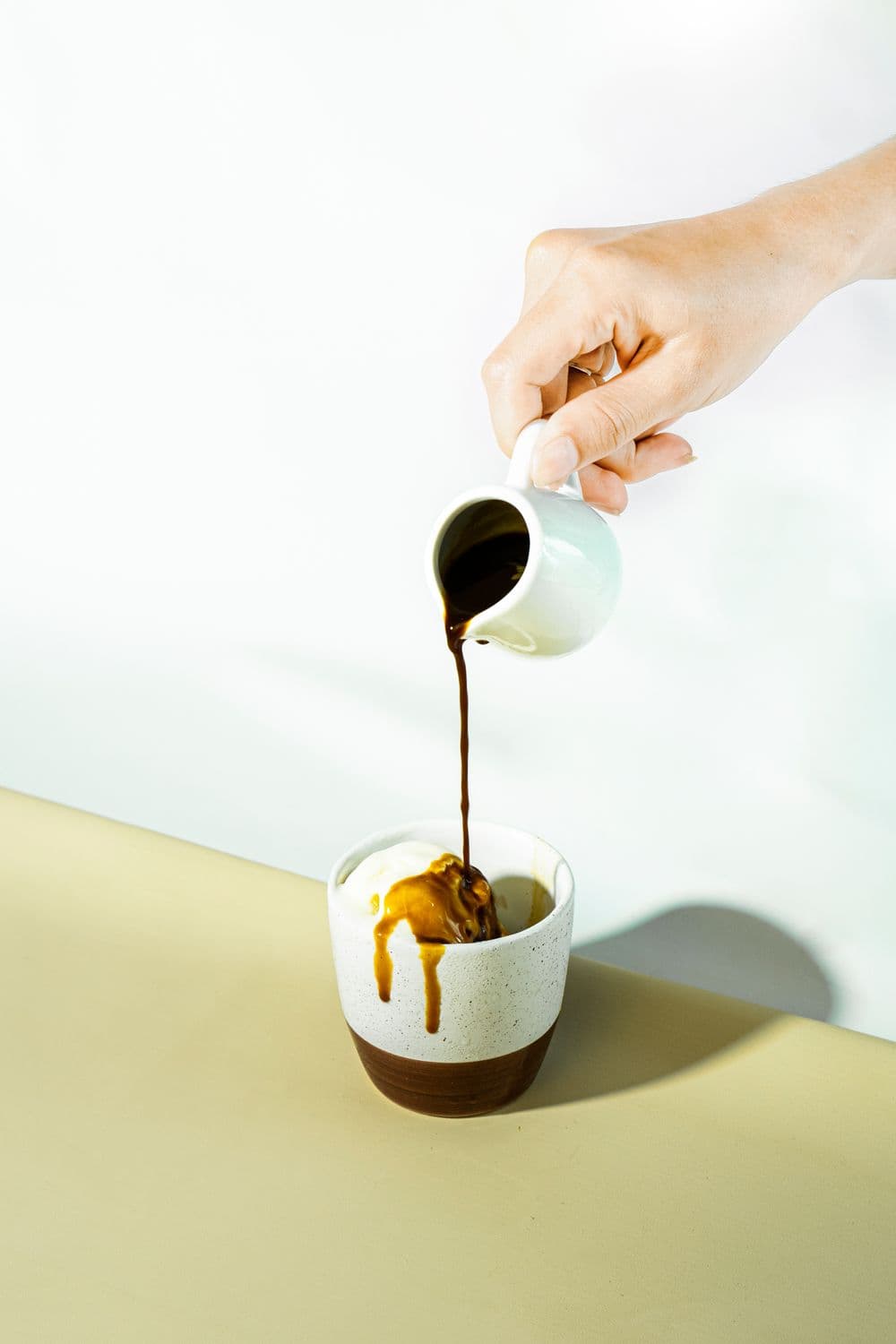 Espresso poured over vanilla ice cream