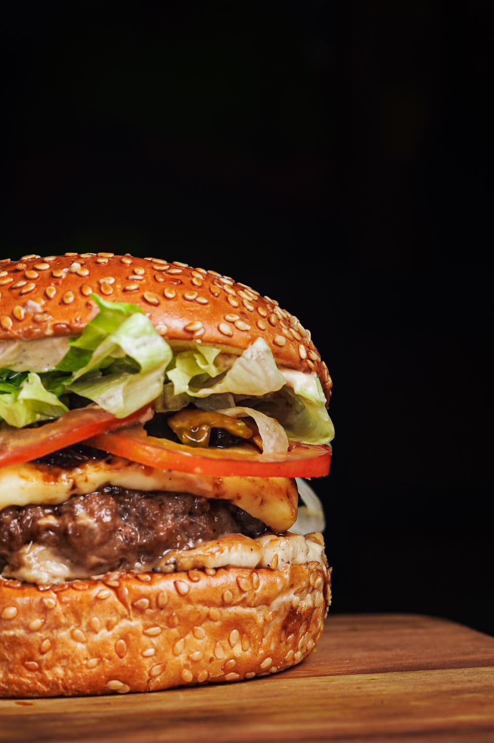 Gourmet burger on a dark board