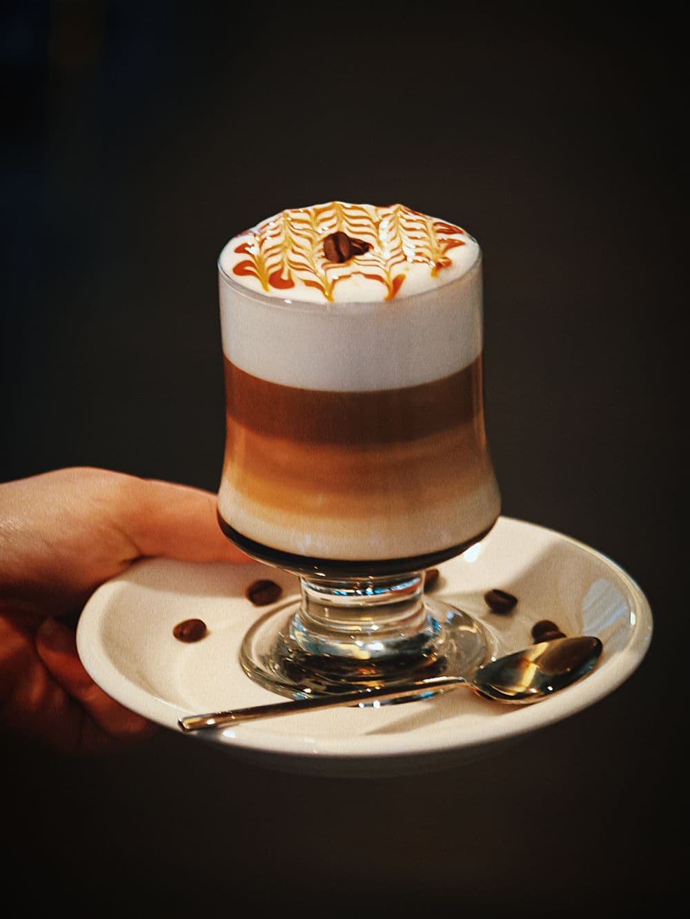 Gold Rush Caramel — layered espresso, caramel and steamed milk